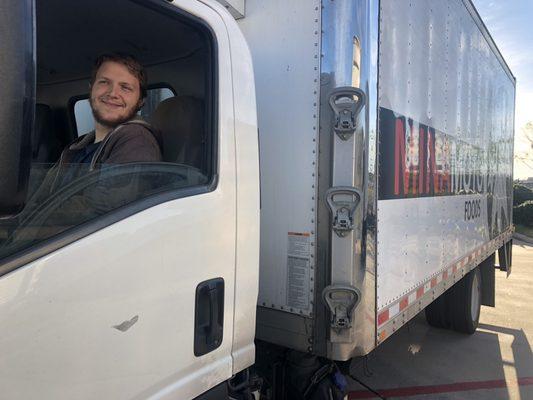 Wearhouse worker prepares for his morning route.