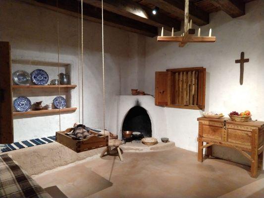 Model of colonial home.