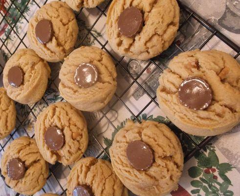 Peanut Butter blossoms with mini Reese pb cups. A creamy alternative to chocolate kisses.