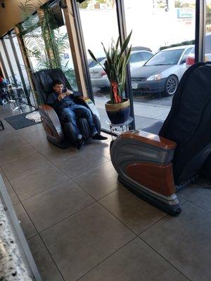 Massaging sofas while you wait