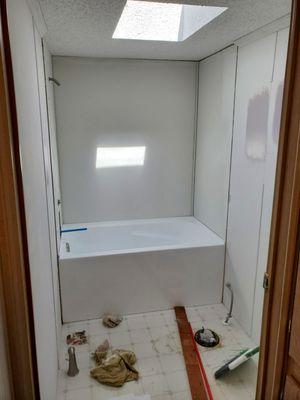 Bathroom remodel after demo, tub installed