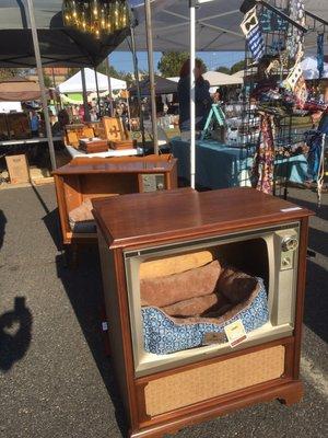 11/12/16. Saturday afternoon. Fall Makers Fair. Old tv's converted into dog beds.(Even better as a liquor cabinet!)