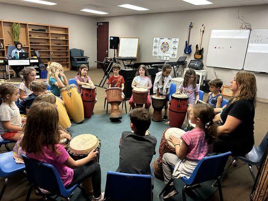 Starting at Kindergarten, students learn the fundamentals of music and learn to play ukulele, drums, and xylophones.