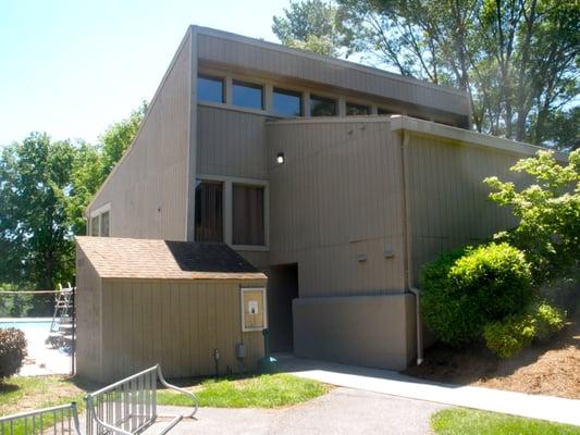 The little shed on the left is the entrance booth to the pool.