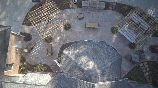 Pavers, pergolas, outdoor kitchen, fireplace, landscaping, and landscape lighting