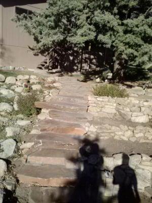 we removed old railroad ties and installed these with a crane. It provided a more natural look to what was there...