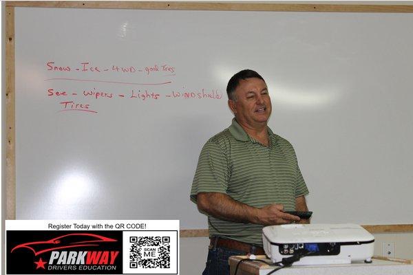 Coach Will in class instructing