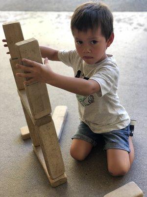 Tillman is very determined to build his skyscraper.