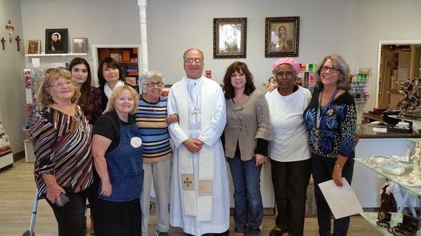 Our crew (minus a few very important people) with Bishop Cotta.