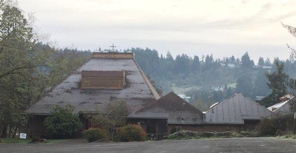 The church building. The tallest portion is the sanctuary (you can just barely see the red door).