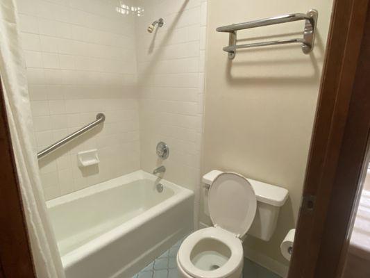 Clean bathroom with the heat lamp in the ceiling