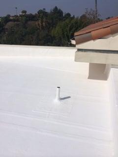 White solar reflective elastomeric roof upgrade coating