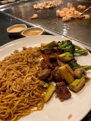 Steak and noodles and fried rice