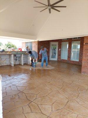 Stomped Concrete, Roof Construction, and Outdoor Kitchen.