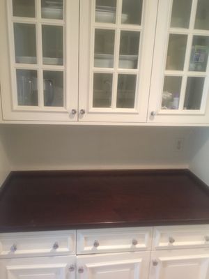 Before:cabinet will be painting and remove countertop stain