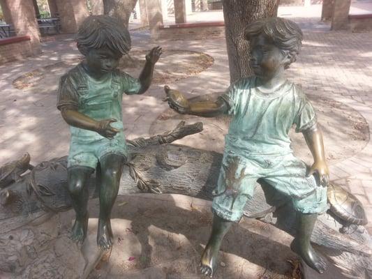 Kid statues all around