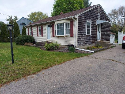 Spring clean up, prune existing bushes around foundation. Weed, edge and mulch existing beds.