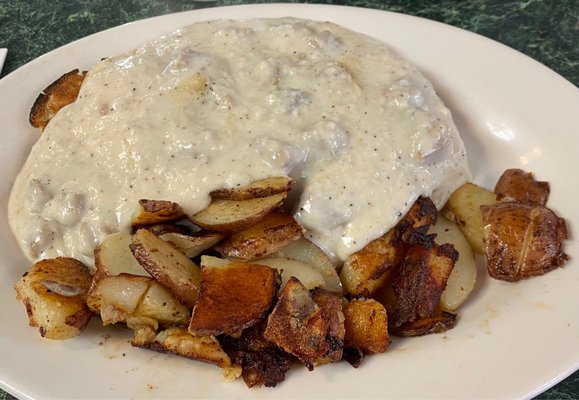 Country Benedict - Eggs and toast under that sausage gravy.