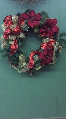 We sell live and artificial Christmas wreaths