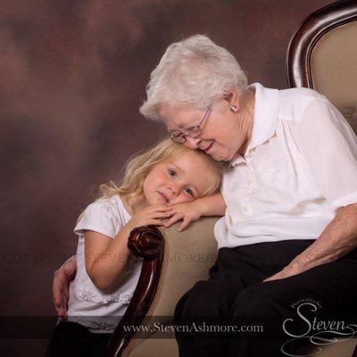 A touching portrait of a beautiful lady with her great granddaughter.