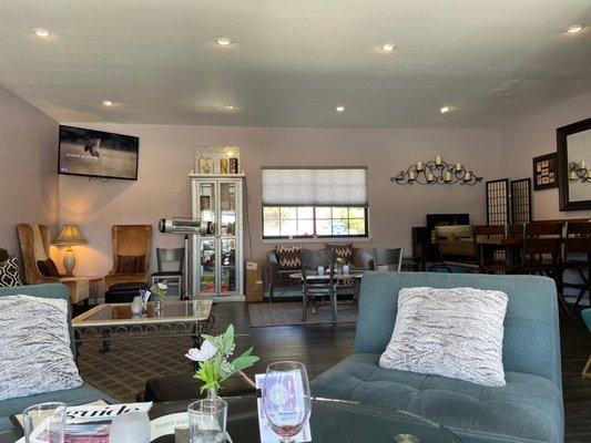 This wine room feels like a living room. Love it!