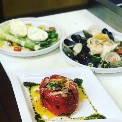 Sausage mozzarella stuffed roasted red pepper----seafood salad-------grilled romaine tricolor grappe tomato local burrata cheese !