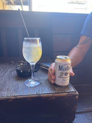 Lemon vodka spritzer and Modelo beer