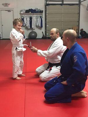 Son getting his first stripe