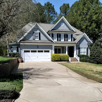 This house got our Soft wash treatment and driveway surface power wash. Nice and clean.