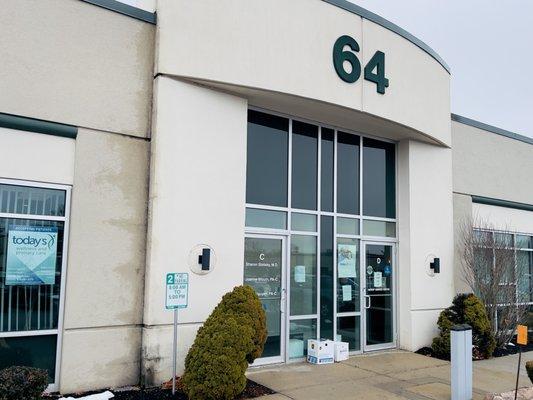 Front office building entrance with on site parking, with accessibility entrance.