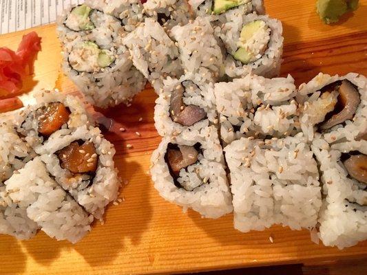 Spicy Salmon Roll (left), California Roll (upper middle), Spicy Yellowtail Roll (right bottom)