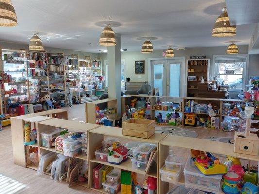 The infant/toddler play area with part of the older kids' section in the background. Everything can go home and 40% is always checked out!