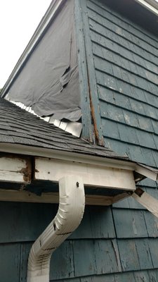 Before picture of a customer's home destroyed by ice dams.