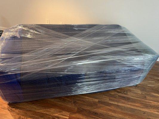 This is a sofa After we wrap with blankets,tape, and shrink wrap Double layer to make sure no damages.