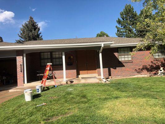 Home painted , soffit repaired and gutter installation.