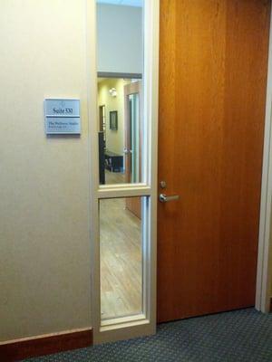 When you get off the elevator on the 5th floor, turn to the right and we are the first door you see.