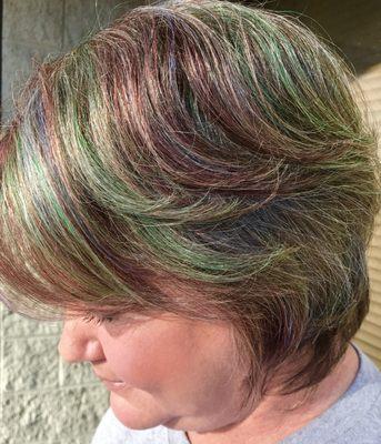 A jewel tone color weave purple green and a red tones it's was a make over that turned out awesome  v