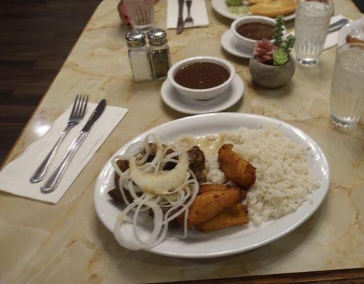 Fried Pork Chunk with white rice, black beans & sweet plantain