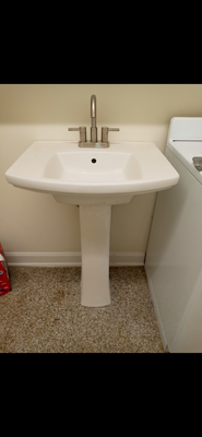 Sink pedestal installed in the laundry room