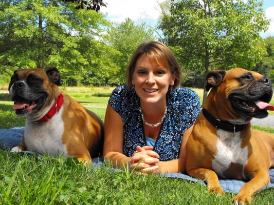 Owner Christine Sanders and her two boxers, Murphy and Benny.