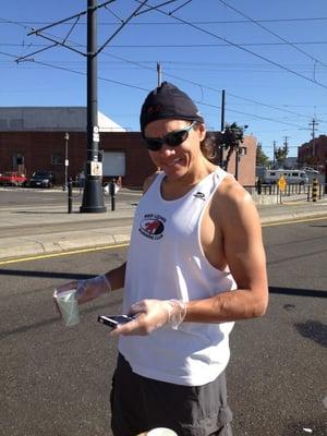 handing out water at the red lizard aid station mile 23.5