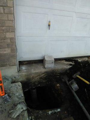 Access hole to raise corner of concrete 2 structure