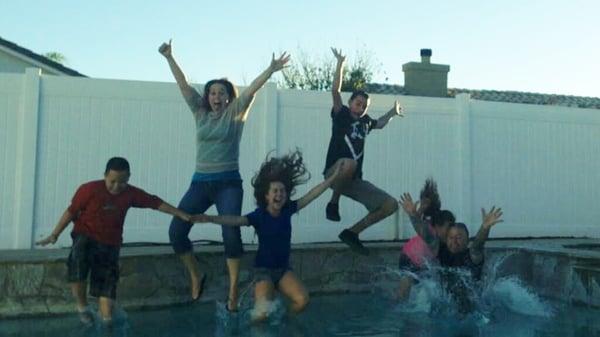 Happy Clients! Jumping for joy into their new pool!