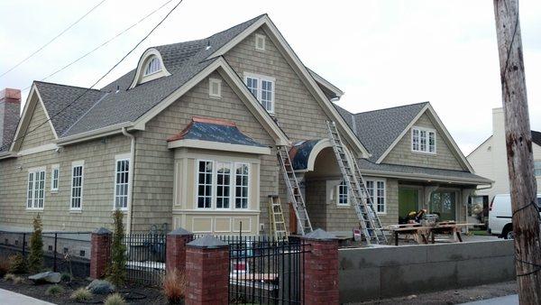 Custom home with pre-stained cedar shingles