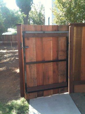 We build our wooden gates with steel frames to help with longevity and support of the gate.