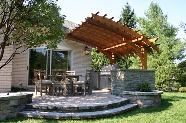 The design of this backyard in New Jersey was a catalyst to create a very dynamic outdoor kitchen pergola.