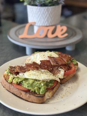 Add fresh local tomato & bacon to our delicious Avocado Toast