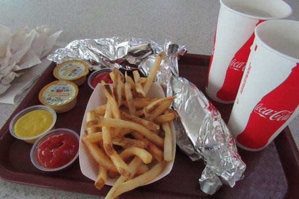 $12 for 2 hot-dogs and 1 order of fries.