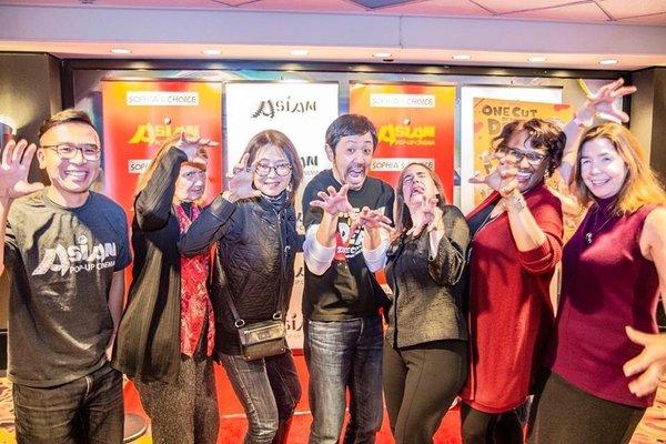 One Cut of the Dead "Zombies" posing with the star on the red carpet.