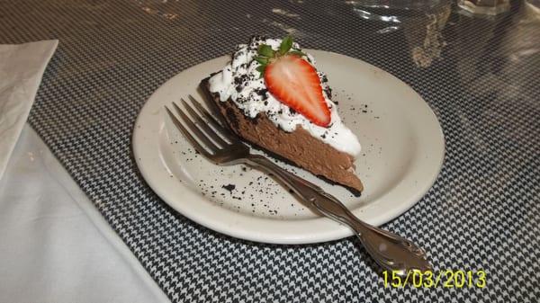 Jack Daniels Chocolate Cream Pie with whipped cream, strawberry slice, AND Oreo crust.  Chocoholic's DREAM!